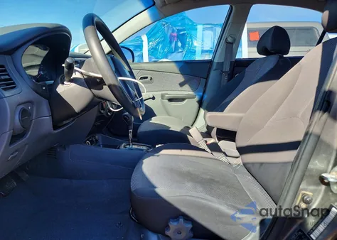 2010 Kia Rio Lx z USA, uszkodzony, nr VIN KNADH4A32A6651670